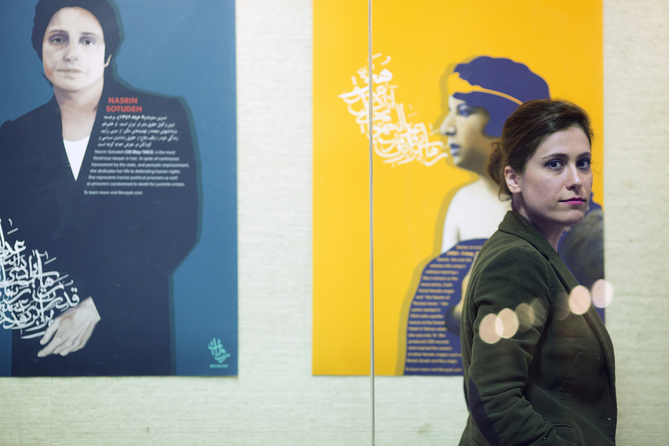 Zohreh Valiary in front of the FAB Gallery Showcase